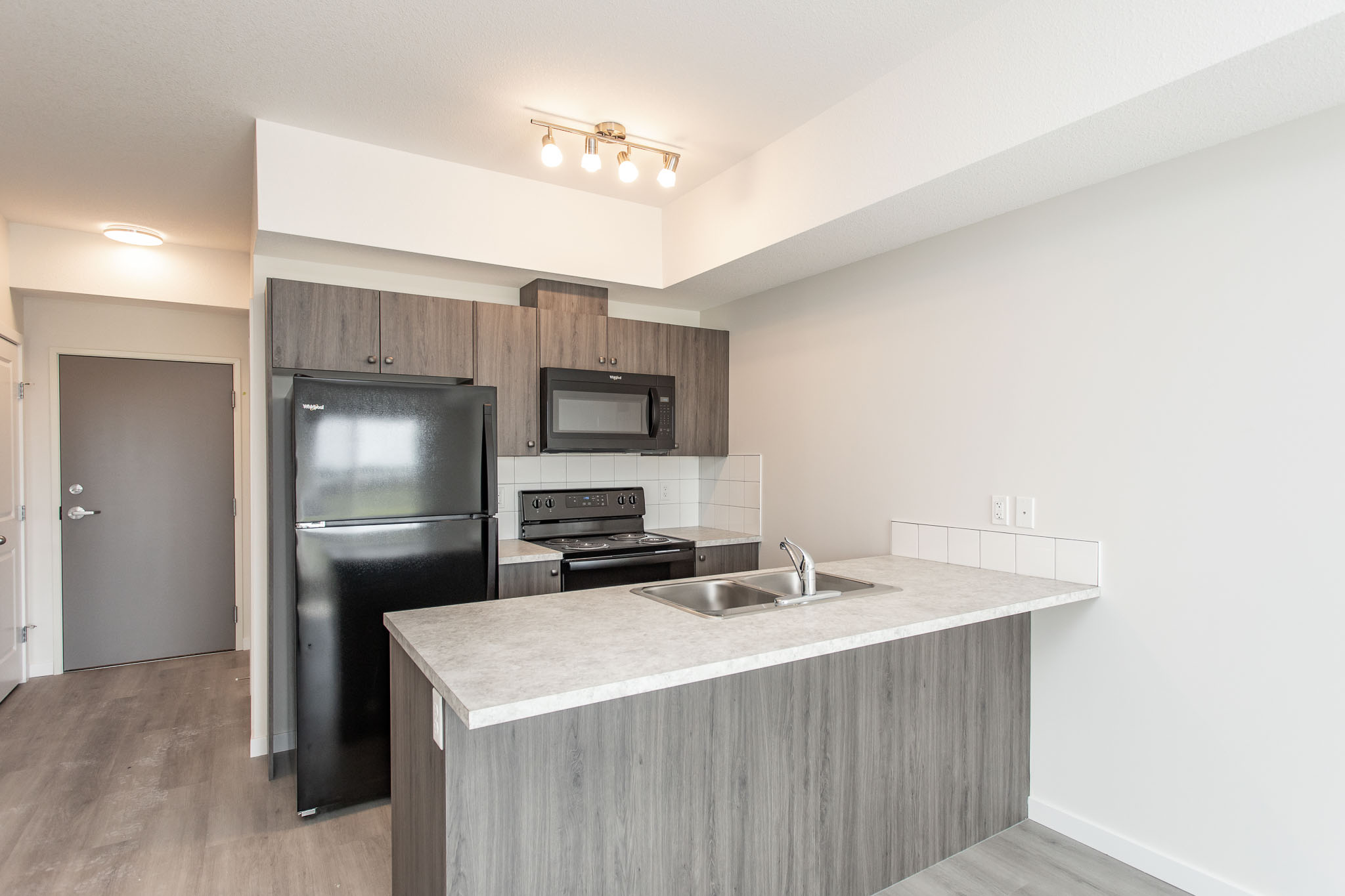 Trilogy West - 1 Bedroom, 1 Bathroom, + Den | Laebon Rental Communities